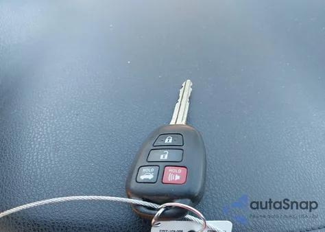 2015 Toyota Corolla Le Eco z USA, uszkodzony, nr VIN 2T1BPRHE2FC394446